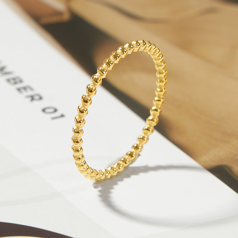 Stapelring met bolletjes goudkleurig